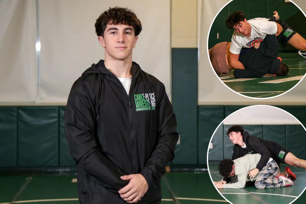 Justin Powers using his sudden Carle Place wrestling stardom to chase...