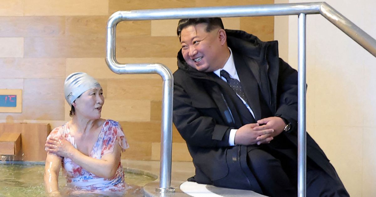 Kim Jong-un seen grinning as he enters women's pool in 'North Korean Benidorm'