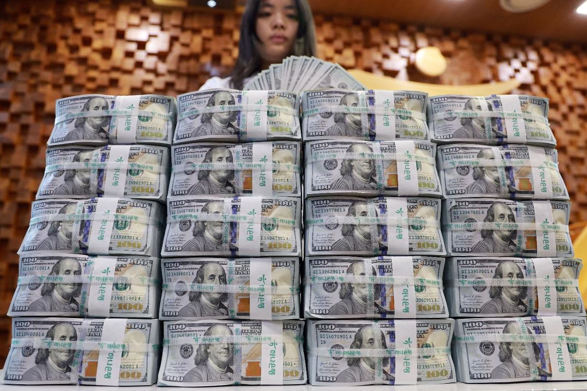 Gov't intervention depletes foreign exchange reserves - The Korea Times