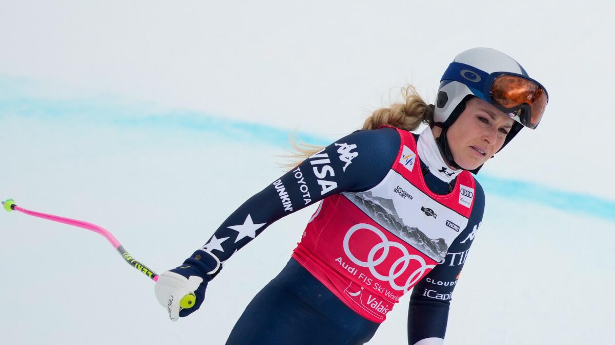 Lindsey Vonn sits out race, but her coach says she is on track for Olympics