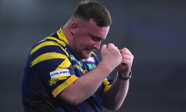 Littler wins back-to-back world darts titles at 18