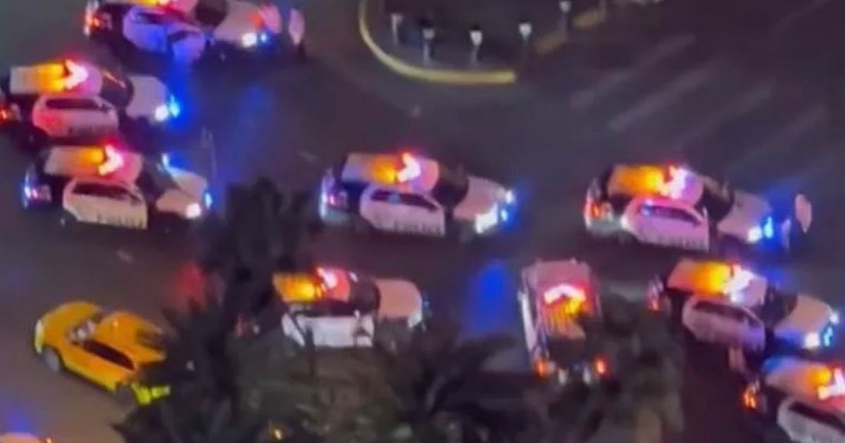 Hotel surrounded by 'at least 30 police cars' with famous boulevard cordoned off