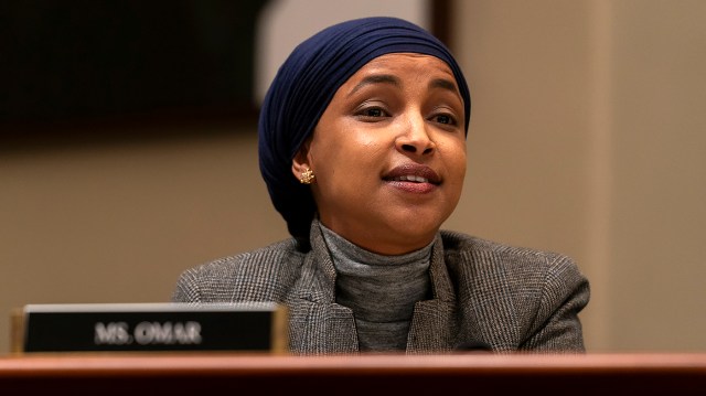 Man tackled after spraying Omar with unknown substance at Minneapolis town hall