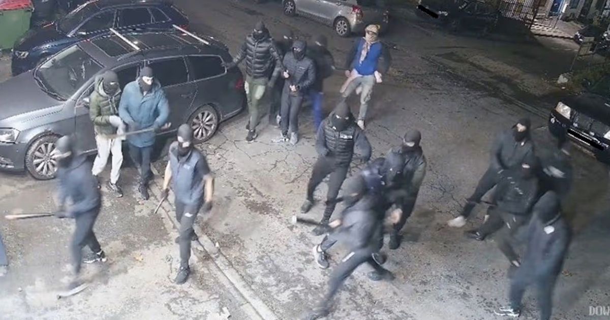 Masked men seen storming Bradford garage in CCTV during 'large-scale affray' - The Mirror