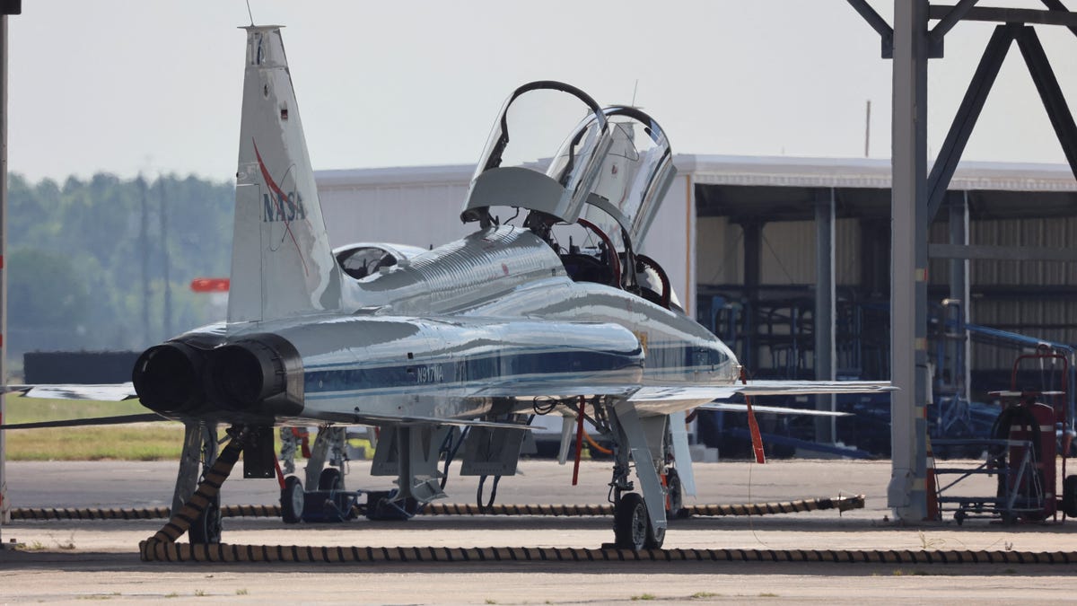 NASA airplane makes belly landing, skids down runway with flames