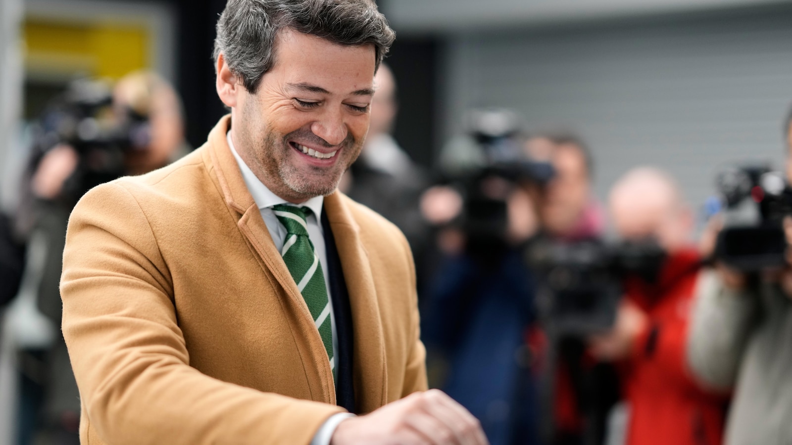 Hard-right populist wins a place in a two-way runoff in Portugal's presidential election
