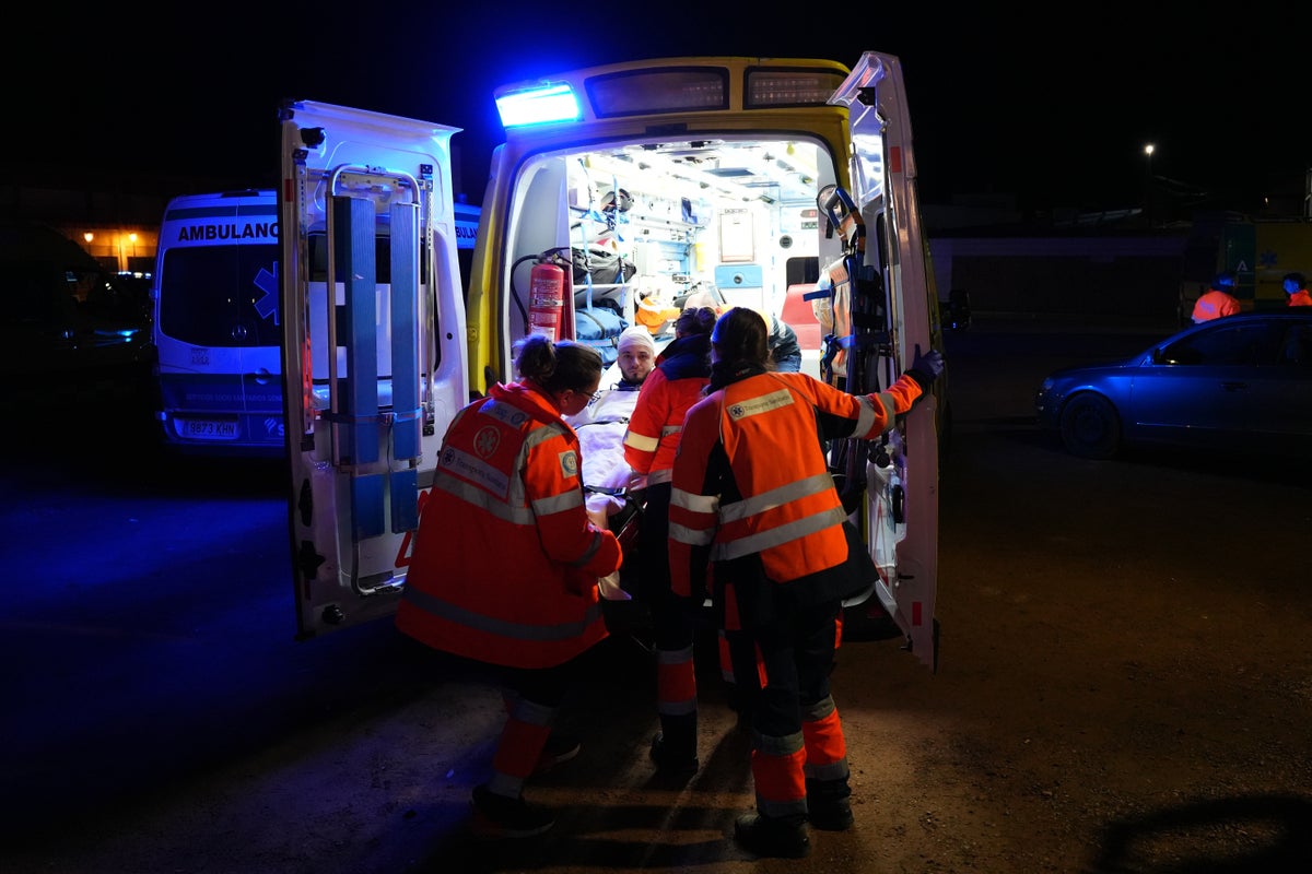 Toll in Spain train collision rises to at least 39 as rescuers search for more bodies