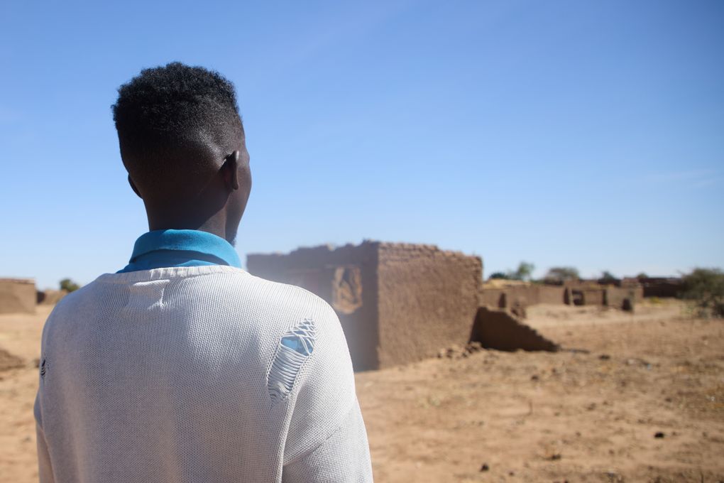 A Sudanese doctor recounts his harrowing escape from a Darfur city under rebel bombardment