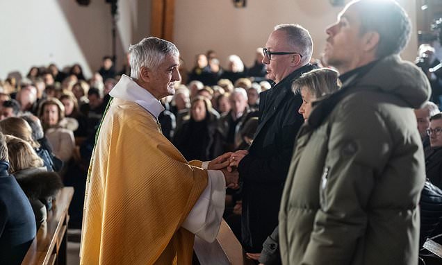 A mother says goodbye to her son as Swiss community grieves after...