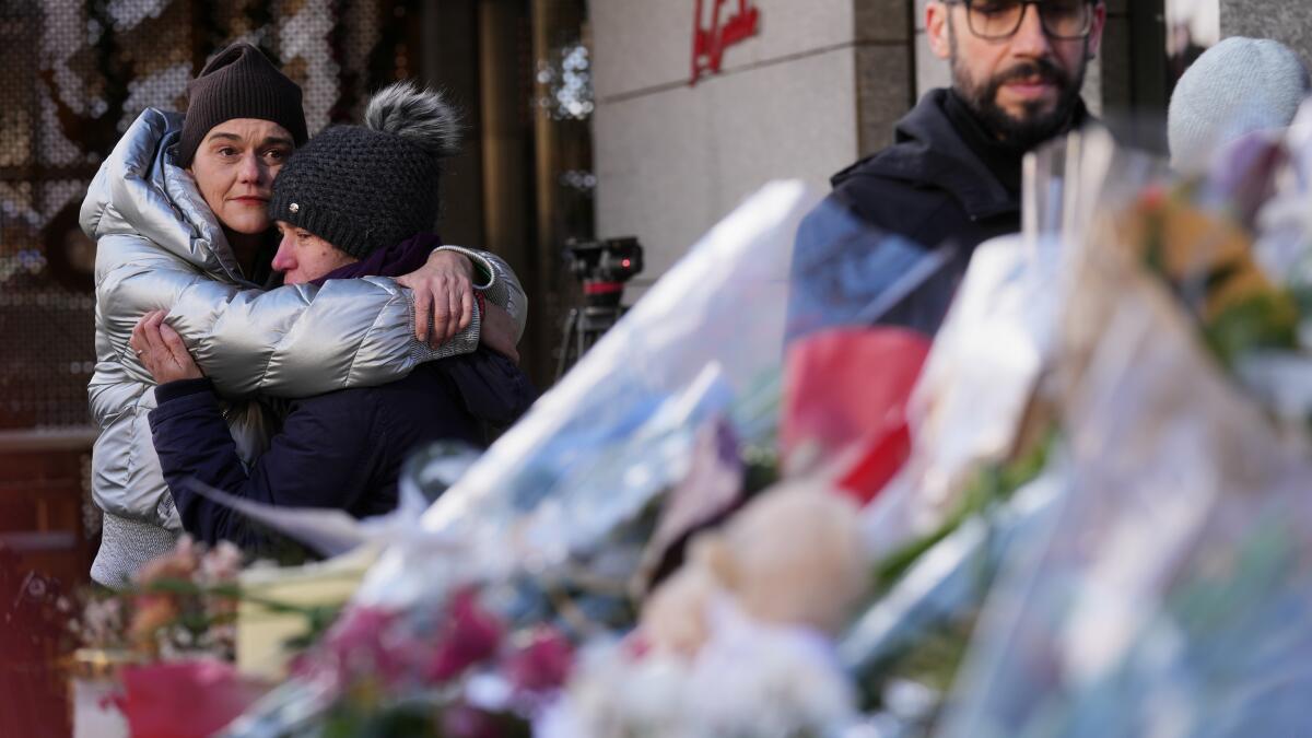 Swiss investigators believe sparkling flares atop wine bottles ignited fatal bar fire