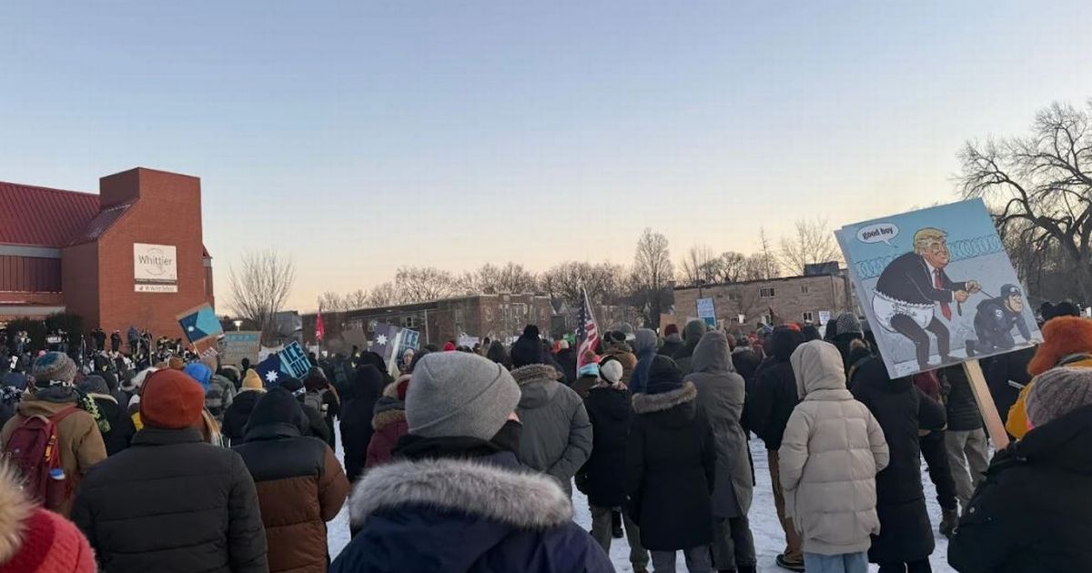 Thousands attend vigil for man shot dead by ICE agents