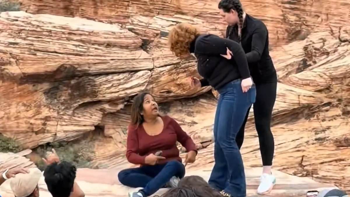 Meddling woman hurls abuse at tourist during squabble over selfie spot
