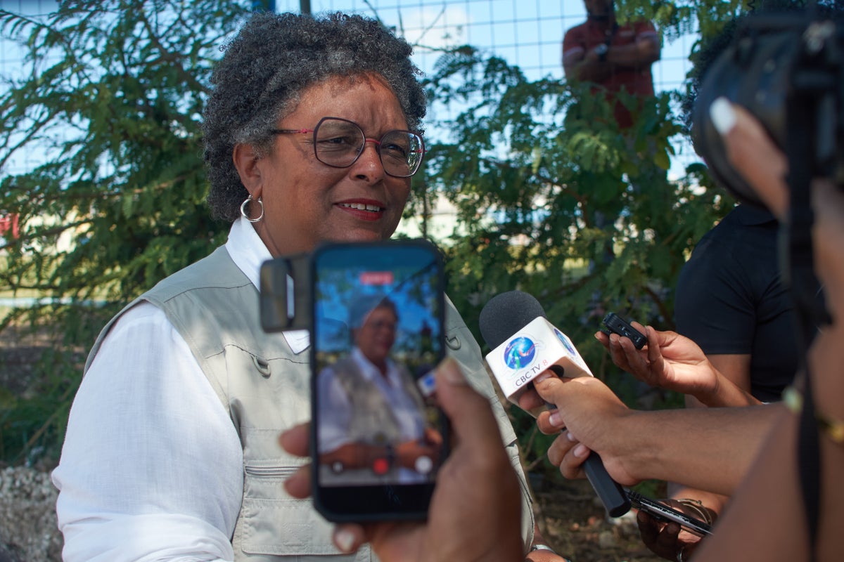 Barbados' prime minister clinches a third term in office after a clean sweep at the polls