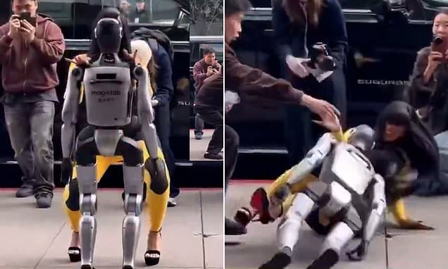 Cardi B suffers hilarious fall while performing a lap dance on a ROBOT