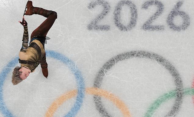 US skating star Ilia Malinin leads after near-perfect short program...