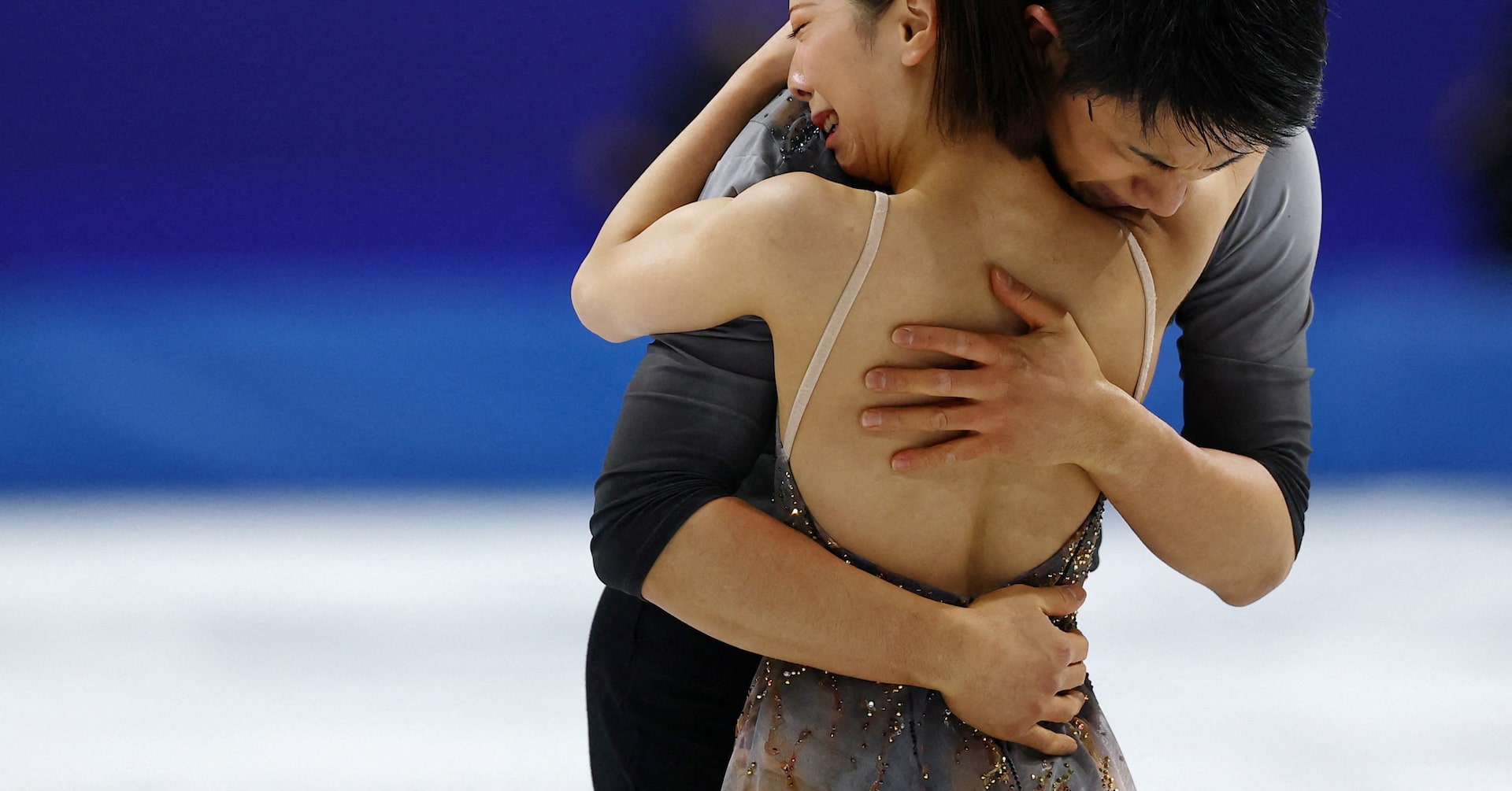 Japanese skating duo Kihara and Miura skate through tears to claim Olympic pairs gold