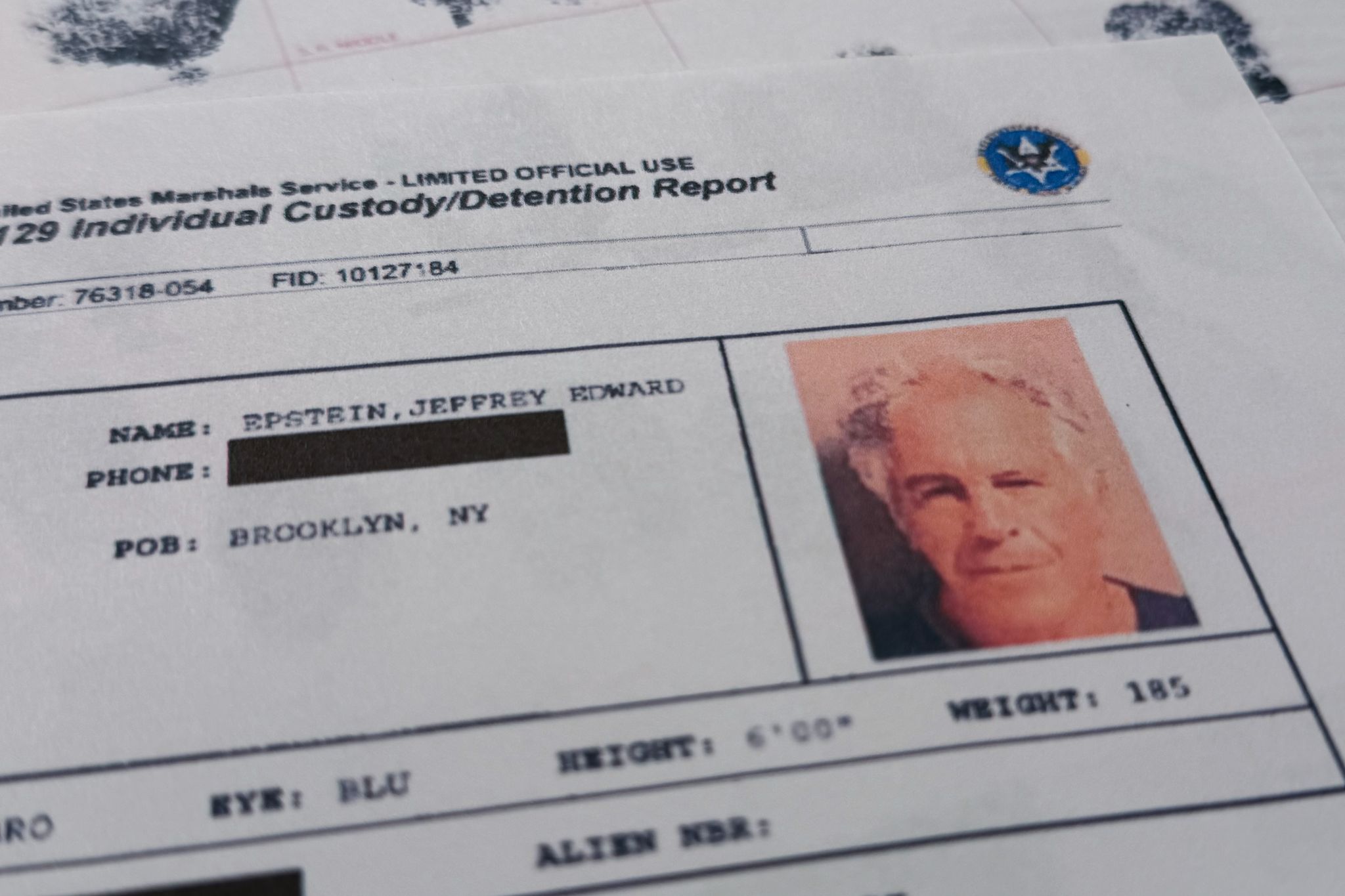 Justice Department says it's taken down Epstein-related files that may have had victim information