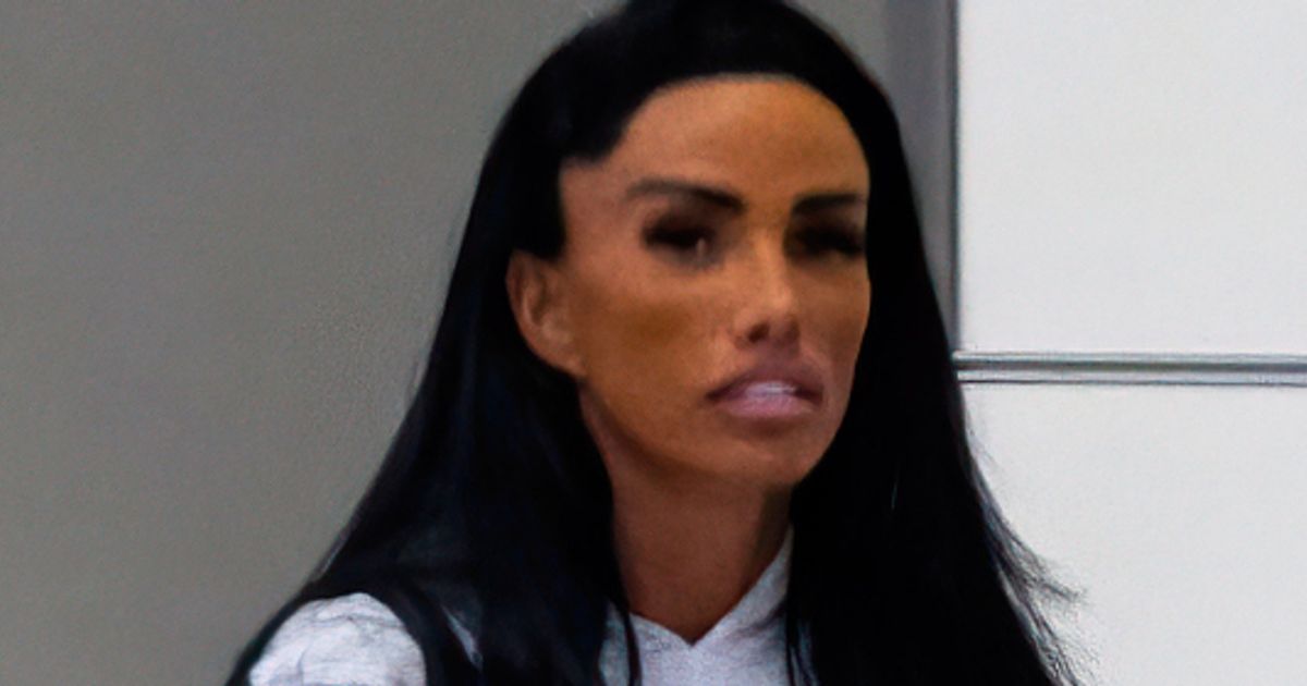 Defiant Katie Price snapped at airport to reunite with hubby despite concerns