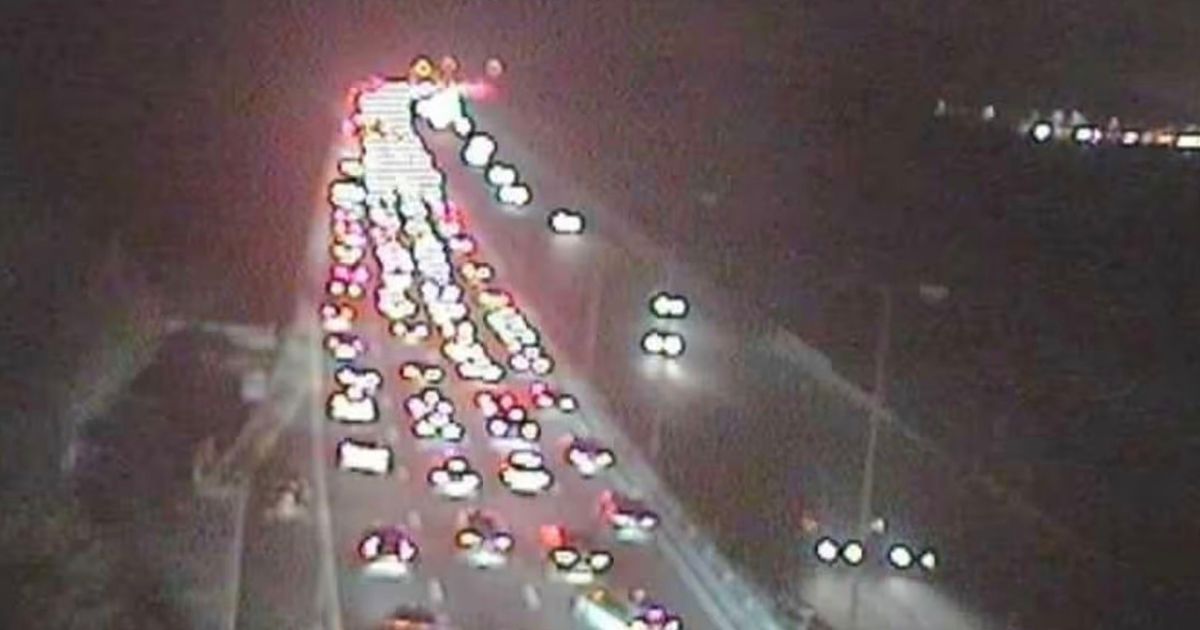 Motorway traffic held after multi-car crash as long queues build