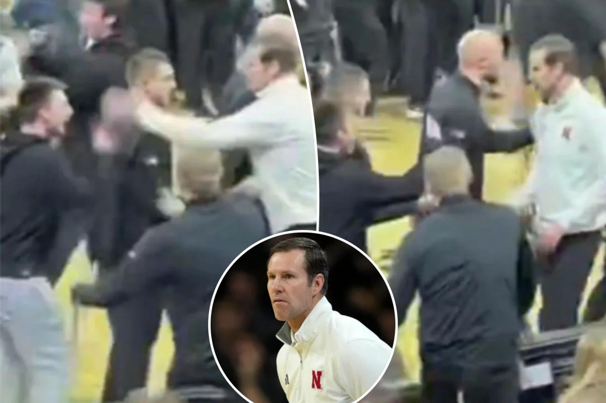 Nebraska's Fred Hoiberg angrily smacks phone out of Iowa fan's hand...