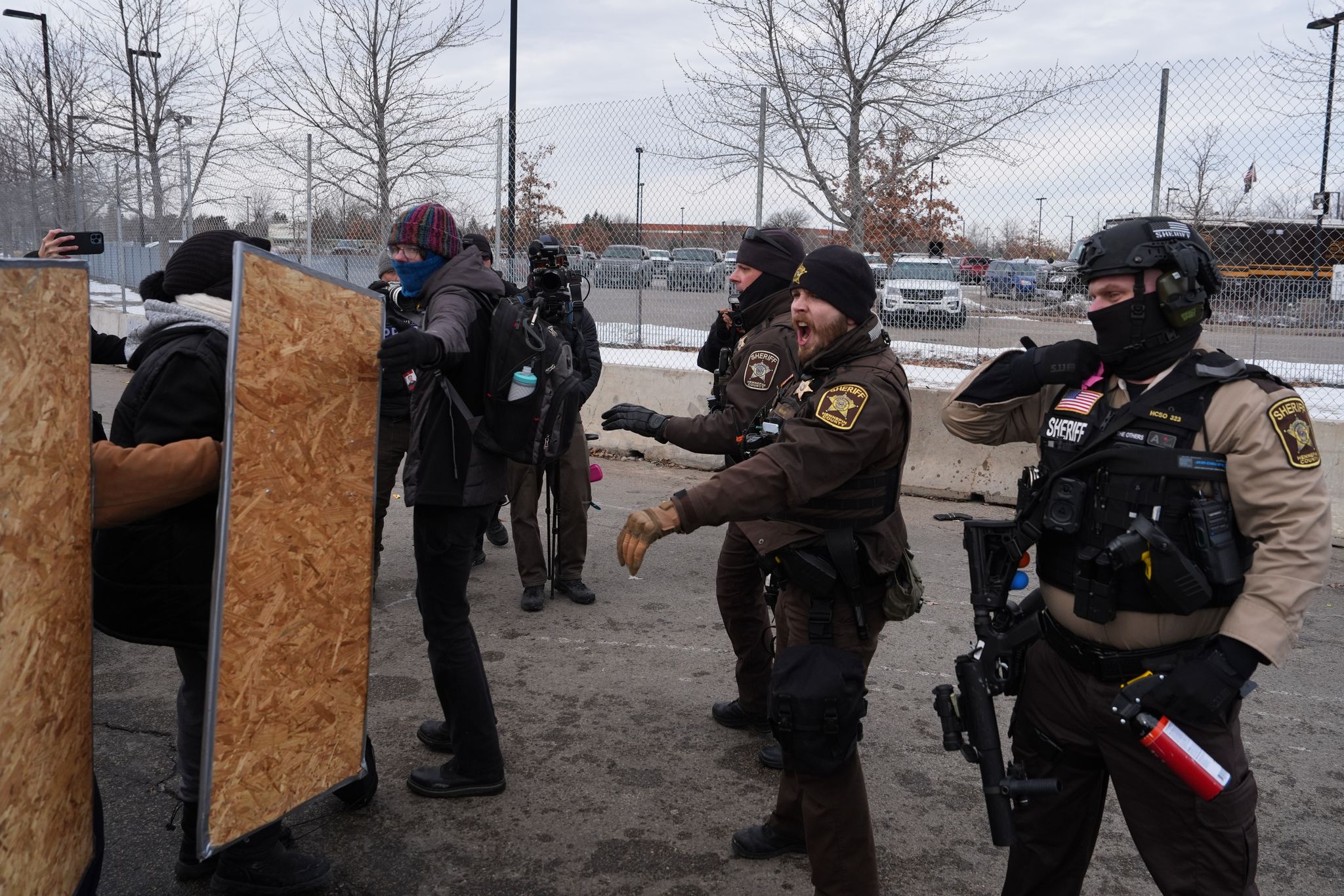 Police arrest protesters at Minneapolis federal building on 1-month anniversary of woman's death