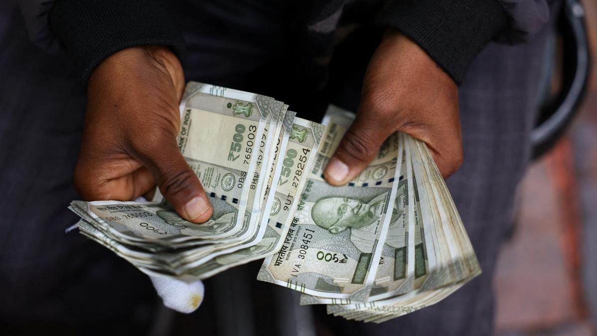 Rupee falls 36 paise to close at 90.70 against U.S. dollar
