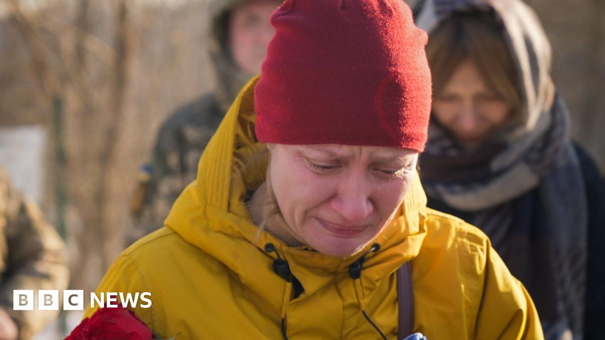 Fearing Russia will occupy her town, a war widow moves her husband's grave to Kyiv