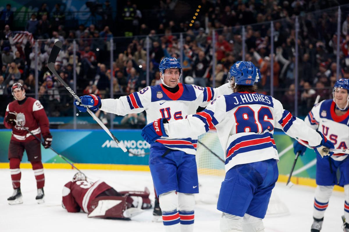 US men's hockey overcomes slow start to beat Latvia in 2026 Olympics...