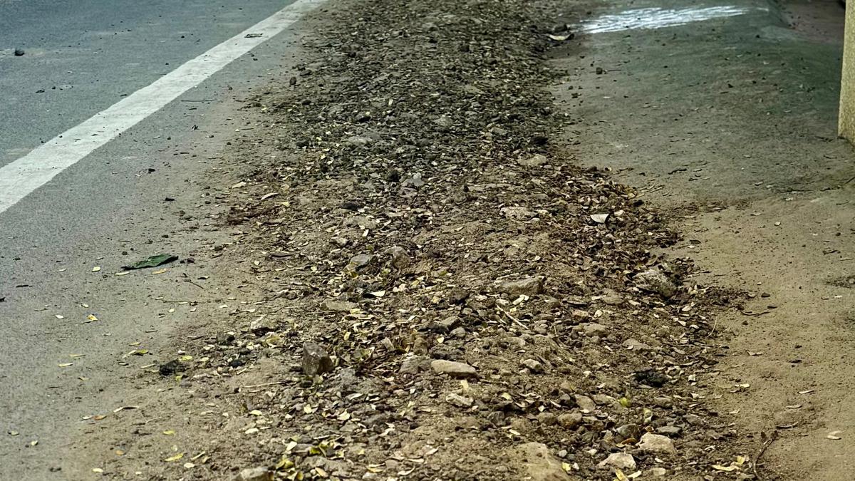 Utility work debris constricts pedestrian space on Samson Saroja Street in Chennai
